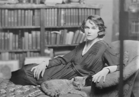 Miss Helen Chamberlain, with Buzzer the cat, portrait photograph, 1918 May 28. Creator: Arnold Genthe.