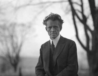 Portrait photograph of Arnold Genthe taken outdoors, between 1911 and 1942. Creator: Arnold Genthe.