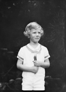 Son of W.G. Kimball, standing outdoors, between 1911 and 1942. Creator: Arnold Genthe.