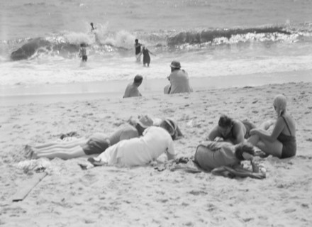 Unidentified group of people, possibly members of the Jewett family, at the beach, c1911-1942. Creator: Arnold Genthe.