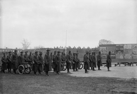 Marine Corps, U.S.N. Machine Gun Unit Demonstration at Ball Park, 1917. Creator: Harris & Ewing.