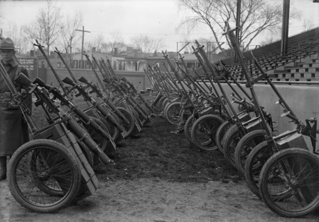 Marine Corps, U.S.N. Machine Gun Unit Demonstration at Ball Park, 1917. Creator: Harris & Ewing.