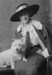 Milholland, Inez (Mrs. Eugene Boissevain), with dog, portrait photograph, 1914. Creator: Arnold Genthe.