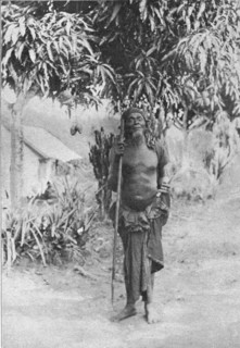 'Un sorcier au Congo francais (Il porte en main l'insigne de ses fonctions..., 1914. Creator: Unknown.