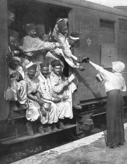''Les Turcos; Un arret dans une Gare d'un train de Tirailleurs', 1914. Creator: Unknown.