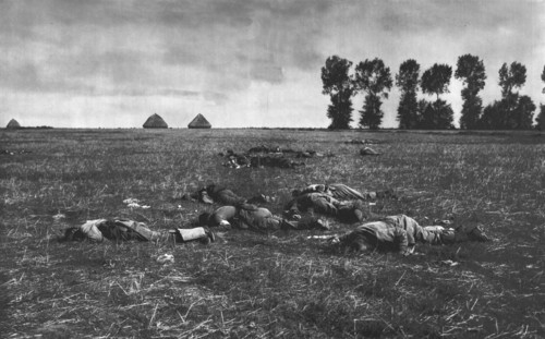''Le Reve Ecroule; Des cadavres Allemands dans la plaine', 1914. Creator: J Simont.