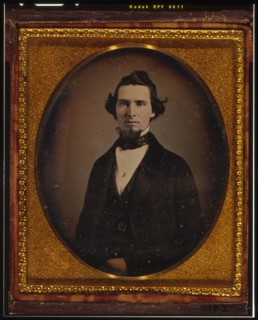 Unidentified man with beard, half-length portrait, facing front, ca. 1855. Creator: Francis Grice.