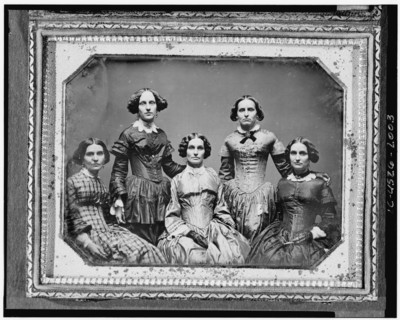Clark sisters, five women, three-quarter length portraits, all facing front, between 1840 and 1860. Creator: Unknown.
