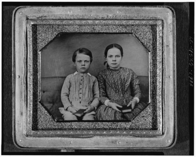 Group portrait of an unidentified boy and girl, three-quarter length, seated..., between 1840 & 1860 Creator: Unknown.