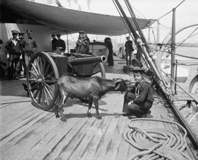 U.S.S. New York, Admiral Sampson's son and "Pitch" the mascot, (1899?). Creator: Unknown.