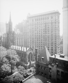 New York, N.Y., Trinity churchyard and the skyscrapers, between 1900 and 1920. Creator: Unknown.