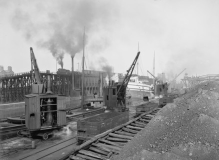 Whirleys unloading ore, Penna. R.R. [Pennsylvania Railroad] docks, Erie, Pa., ca 1900. Creator: William H. Jackson.