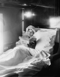 Electric-lighted berth on a deluxe overland limited train, between 1910 and 1920. Creator: William H. Jackson.