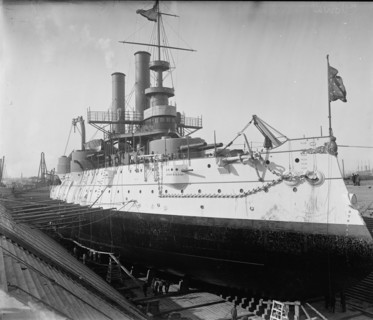 U.S.S. Iowa in dry dock, Brooklyn Navy Yard, between 1897 and 1901. Creator: Unknown.