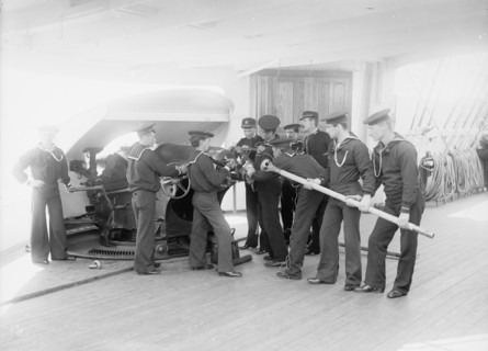 U.S.S. Newark, loading 6-inch gun, between 1891 and 1901. Creator: Unknown.