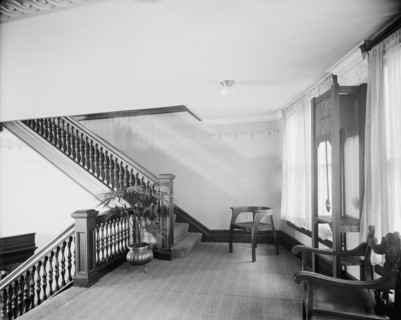 E.M. Bigsby Co. show rooms, clock on the balcony, between 1900 and 1915. Creator: Unknown.