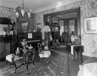 Douglas residence, parlors with arch between, Detroit, Mich., between 1905 and 1915. Creator: Unknown.