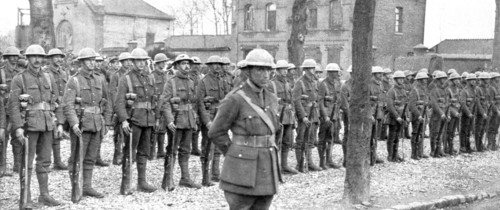 ''Aux armees Britanniques; Le nouveau casque anglais', 1916 (1924) Creator: Unknown.