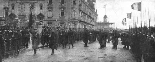 'Le deuxieme anniversaire de L'Yser; le defile du 12e de ligne belge, son glorieux..., 1916. Creator: Unknown.