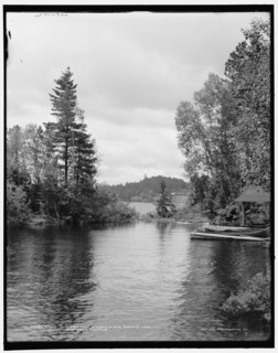 The Antlers from St. Hubert's Isle, Raquette Lake, Adirondack Mountains, (1902?). Creator: William H. Jackson.