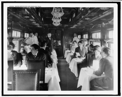Dining car on a deluxe overland limited train, between 1910 and 1920. Creator: Unknown.