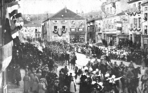 'La patrie retrouvee; A Morhange, le 18 novembre: de jeunes Lorraines fleurissent les..., 1918. Creator: Unknown.
