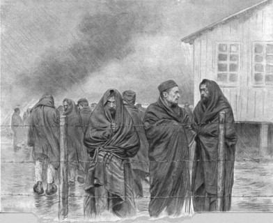'La vie de nos prisonniers; au meme camp: convalescents, enveloppes dans des couvertures.... Creator: Unknown.