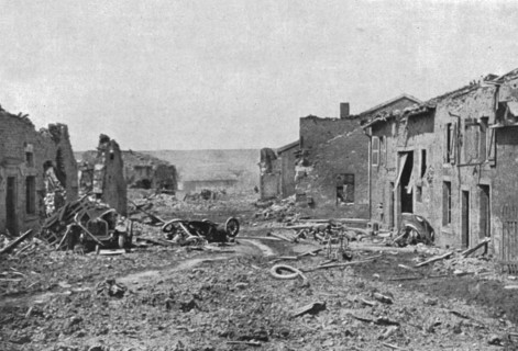 'Devant Verdun; La rue principale de Fleury-devant-Douaumont: les deux camions don’t..., 1916. Creator: Unknown.
