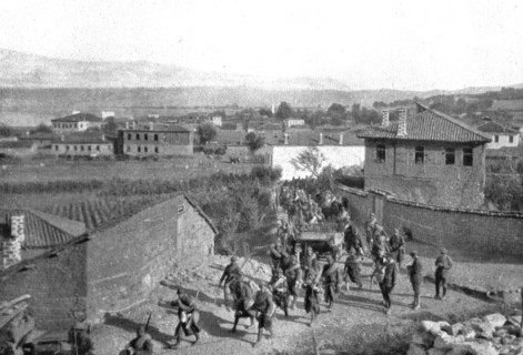 On the Eastern Front; Our Zouaves cross Pogradec, at the southern end of Lake Ohrid..., 1917. Creator: Unknown.