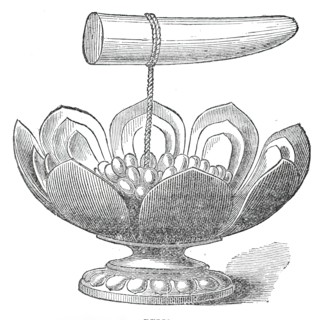 The Dalada, or tooth relic of Buddha, and golden lotus flower in the Maligawa Temple, Kandy..., 1876 Creator: Unknown.