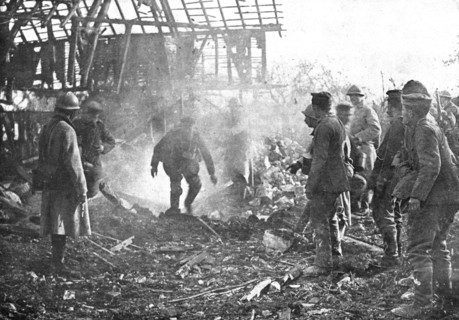 'Dans Cantigny; au milieu de la fumee des lance-flammes, les Allemands, un par un..., 1918. Creator: Unknown.