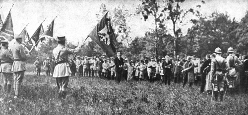 'Parmi les soldats de l'entente; la remise des drapeaux offerts par Paris, Nancy, Belfort..., 1918. Creator: Unknown.