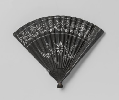 Paper mourning fan with white floral motif..., c.1850-c.1899.  Creator: Anon.