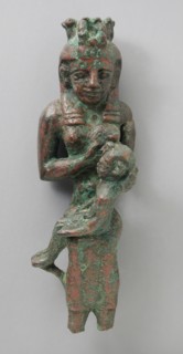 Seated Isis with Uraeus Modius Holding Child on her Lap, Late Period-Ptolemaic Period (711-30 BCE). Creator: Unknown.