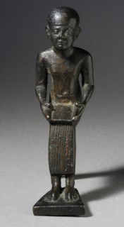 Seated Figure of the God Imhotep Holding a Scroll, 712-332 B.C. or later. Creator: Unknown.