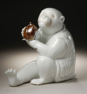 Costumed Monkey Holding a Chestnut, 19th century. Creator: Unknown.