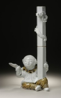 Chinese Boy (karako) Holding Candlestick with Raised Dragon, 19th century. Creator: Unknown.