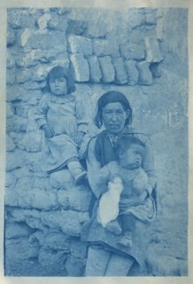 A Pueblo woman with two children (image 1 of 2), c.1890. Creator: Charles Fletcher Lummis.