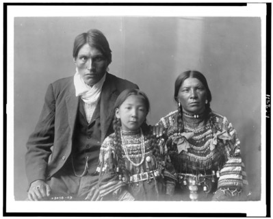 Reuben Black Boy and family, c1910. Creator: Edward Sheriff Curtis.