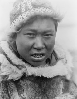 Hooper Bay youth, c1929. Creator: Edward Sheriff Curtis.
