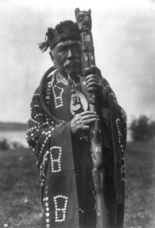 Hamasaka in Tluwulahu costume with speaker's staff-Qagyuhl [principal chief], c1914. Creator: Edward Sheriff Curtis.