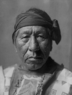 Sitting Owl-Hidatsa, c1908. Creator: Edward Sheriff Curtis.