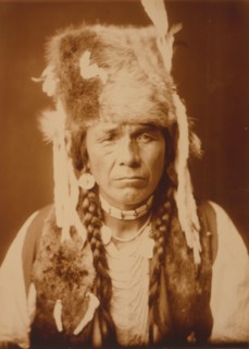 Nez Percé with furcap, c1904. Creator: Edward Sheriff Curtis.