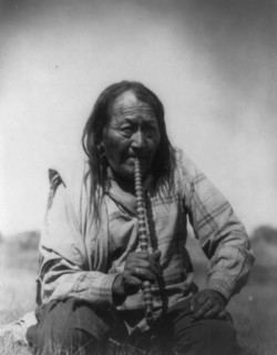 Arapaho Indian smoking pipe, c1910. Creator: Edward Sheriff Curtis.