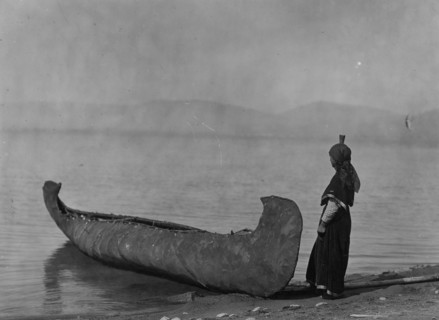On the shore of the lake-Kutenai, c1910. Creator: Edward Sheriff Curtis.