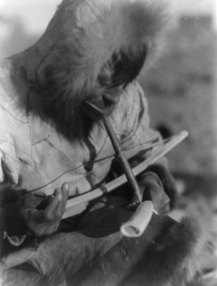 Drilling ivory-King Island, c1929. Creator: Edward Sheriff Curtis.