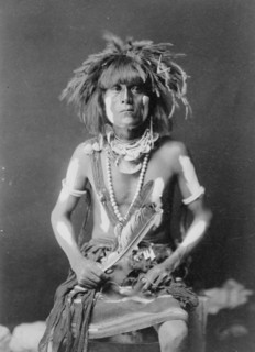 Honovi-Walpi snake priest, with Totkya Day painting, c1910. Creator: Edward Sheriff Curtis.