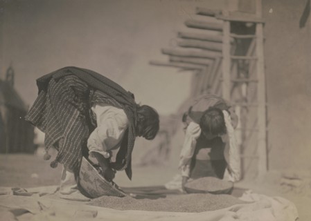 Cleaning wheat-San Juan, c1905. Creator: Edward Sheriff Curtis.