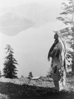 Praying to the Spirits at Crater Lake-Klamath, c1923. Creator: Edward Sheriff Curtis.