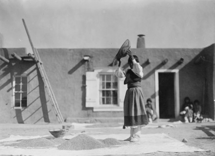 Winnowing wheat, c1905. Creator: Edward Sheriff Curtis.